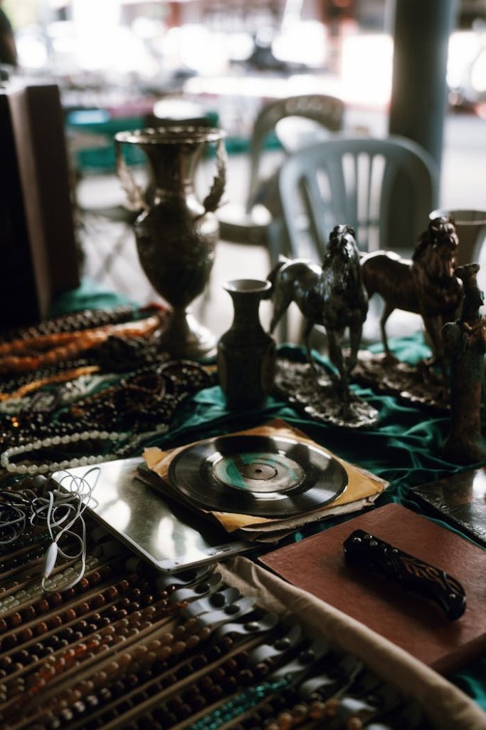Explore a bustling Antalya antiques market showcasing vintage records and unique artifacts.